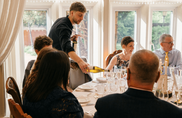 Serving wedding drinks at Berwick Lodge