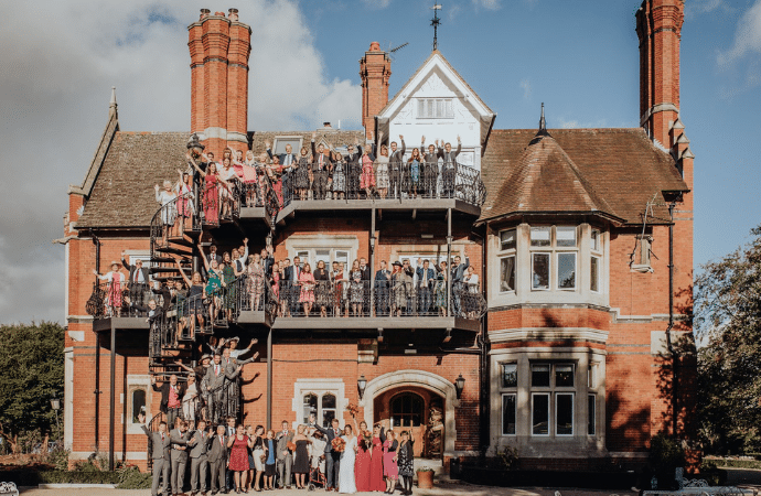 Large party gathering at front of Berwick Lodge Bristol